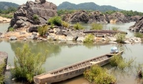 A boat on the shore of Don Khon in the 4000 Islands on Laos.