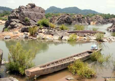 A boat on the shore of Don Khon in the 4000 Islands on Laos.