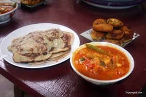 The finished products: banana pancakes, fish curry, and chicken cutlets.