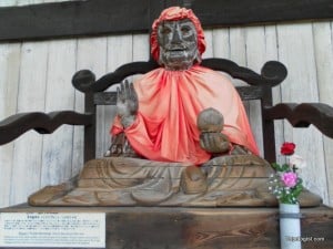 An odd looking statue sitting outside of Todaiji Temple in Nara Park.