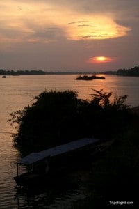 The sun sets over the Mekong River on Don Dhet in Laos.