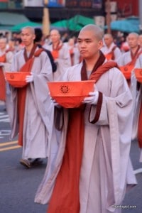 Buddhist Monks carrying lanterns during the Lotus Lantern Festival Parade.