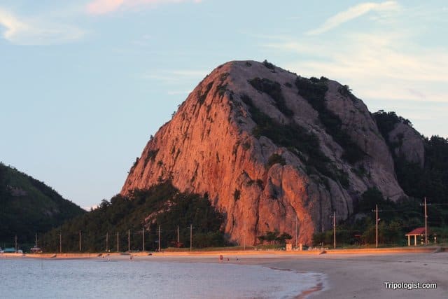 Manjubong standing guard over Seonyudo's main beach at sunset.