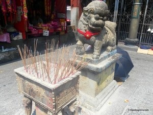 There are several temples in Chinatown worth seeing, including Kuan Yin Teng, where this majestic lion statue is located.