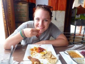 Roasalie Reynolds eating curry and rice Sri Lankan style.