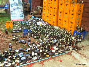 Beer bottles behind a hostel in Laos - Drinking every night is a great way to ruin your vacation.