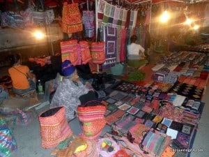 Haggling while shopping in local markets, like this one in Luang Prabang, Laos, can save you a lot of money.